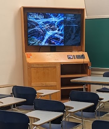 A view of the cabinet with high definition LCD monitor, wireless input, and a push button controller.