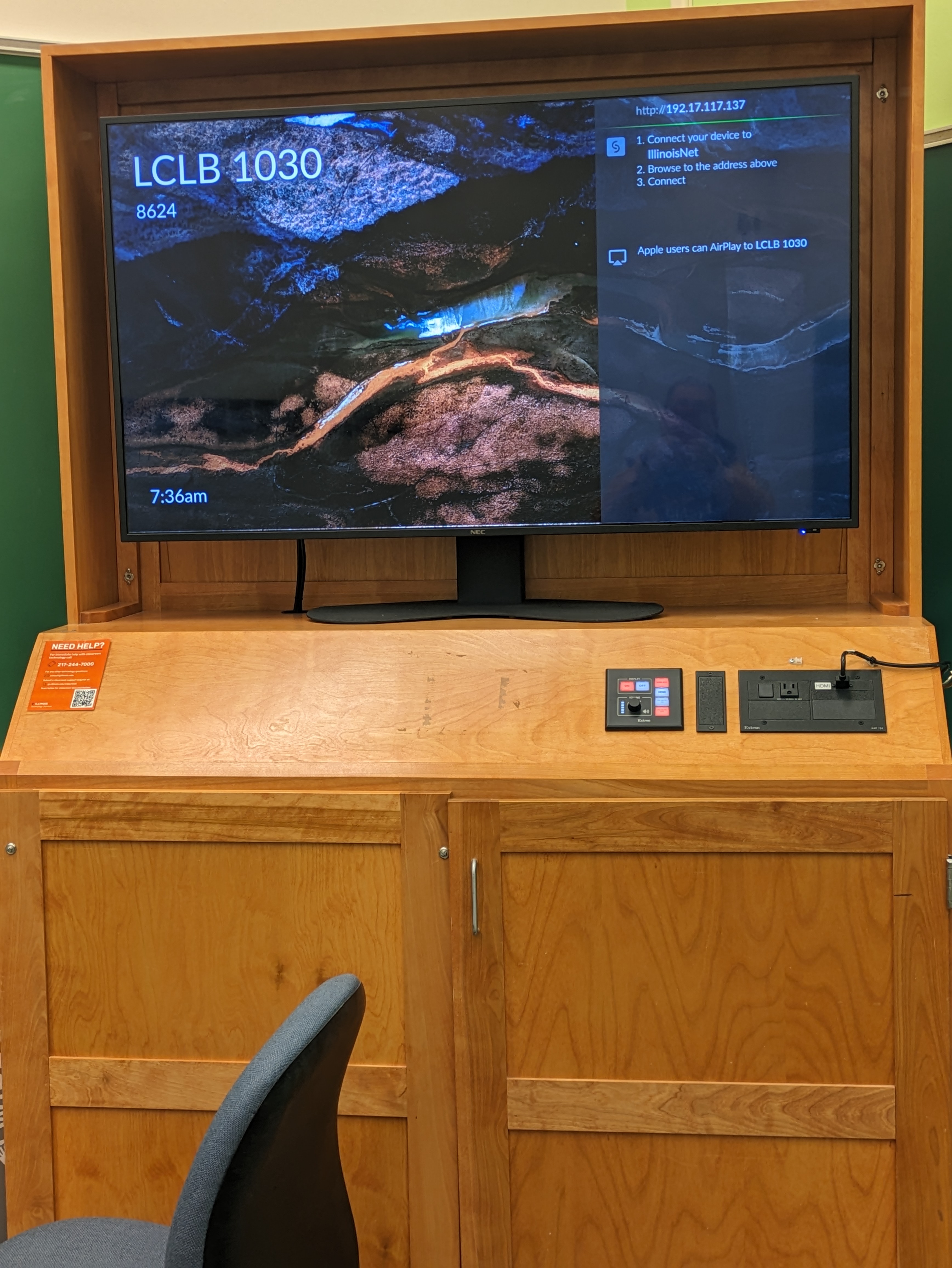 A view of the cabinet with a high definition LCD monitor, wireless input, and a push button controller