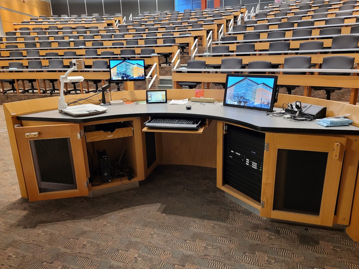 Image of a classroom lectern with a PC monitor and document camera.